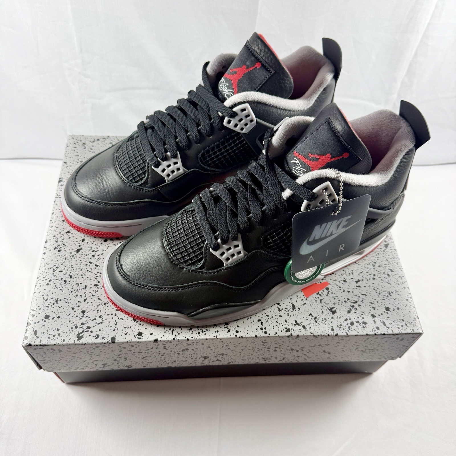 Jordan Air Jordan 4 Retro Bred Reimagined Black/Red/Grey Leather Sneaker Jordan Air Jordan 4 Retro Bred Reimagined Black/Red/Grey Leather Sneaker
