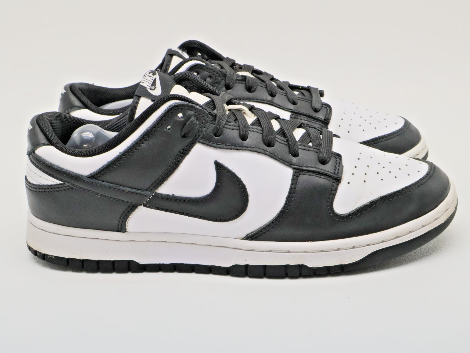 nike dunk low retro "panda black & white" low sneakers dd1391 100 men's size 10 nike dunk low retro "panda black & white" low sneakers dd1391 100 men's size 10