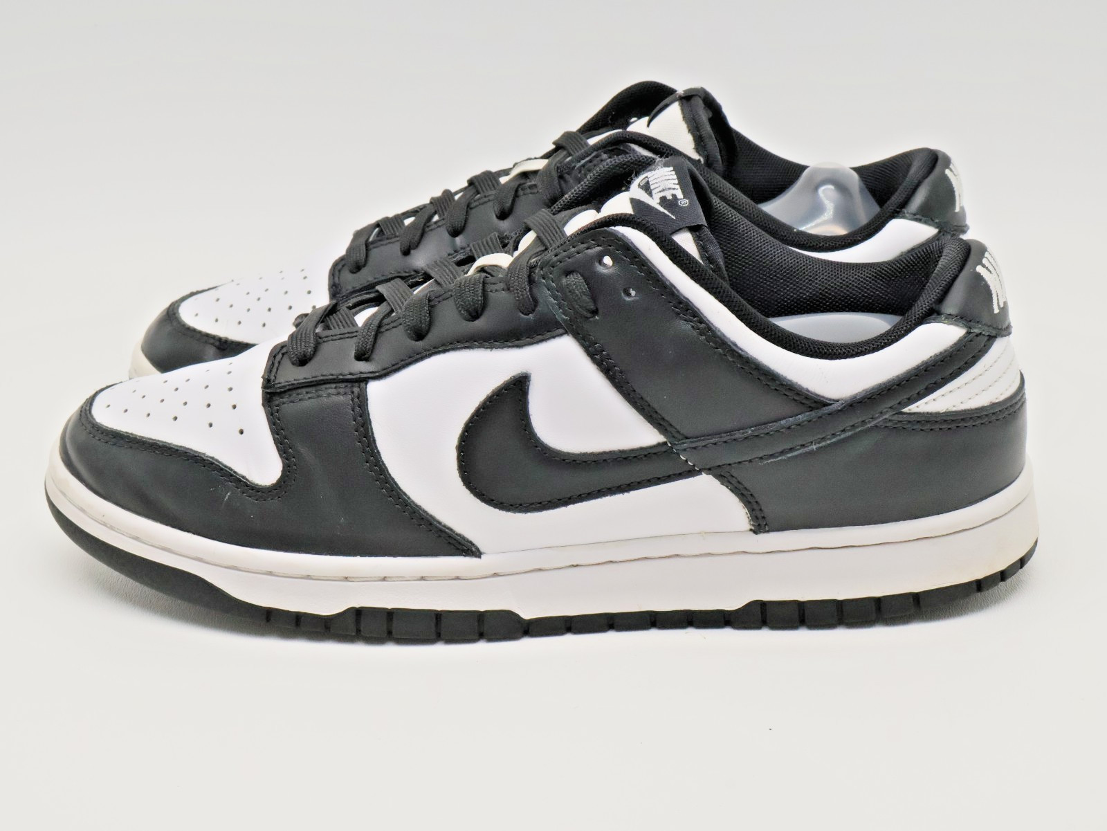 nike dunk low retro "panda black & white" low sneakers dd1391 100 men's size 10 nike dunk low retro "panda black & white" low sneakers dd1391 100 men's size 10