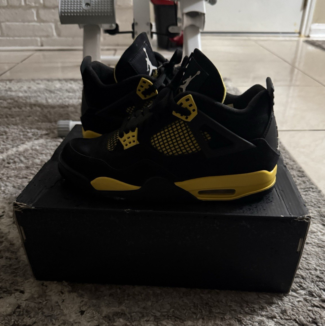 jordan air jordan 4 retro thunder black/tour yellow mid top sneaker dh6927 017 jordan air jordan 4 retro thunder black/tour yellow mid top sneaker dh6927 017