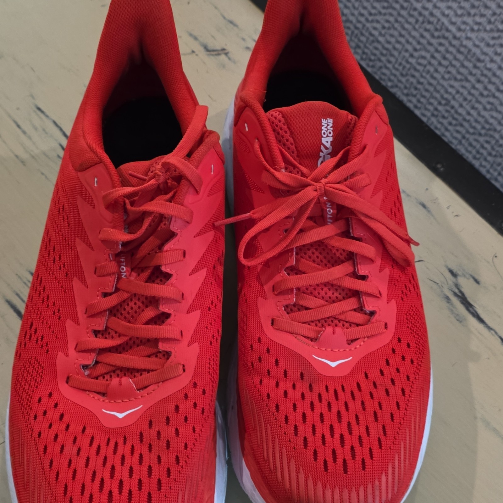 hoka one one clifton men’s lace up low top running sneaker red/white 1110508 hoka one one clifton men’s lace up low top running sneaker red/white 1110508