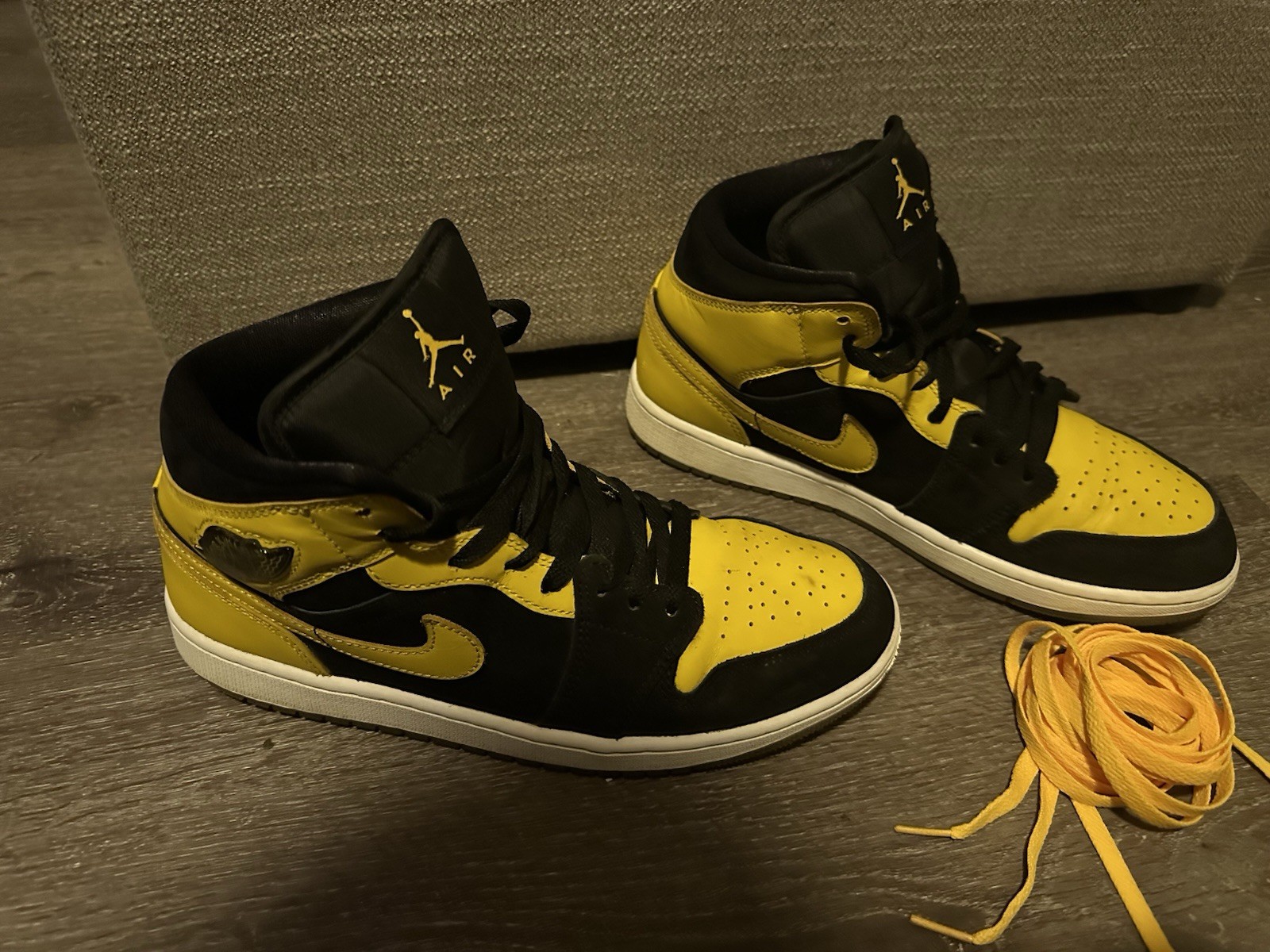 jordan air jordan 1 mid yellow/black leather high top men's sneaker jordan air jordan 1 mid yellow/black leather high top men's sneaker