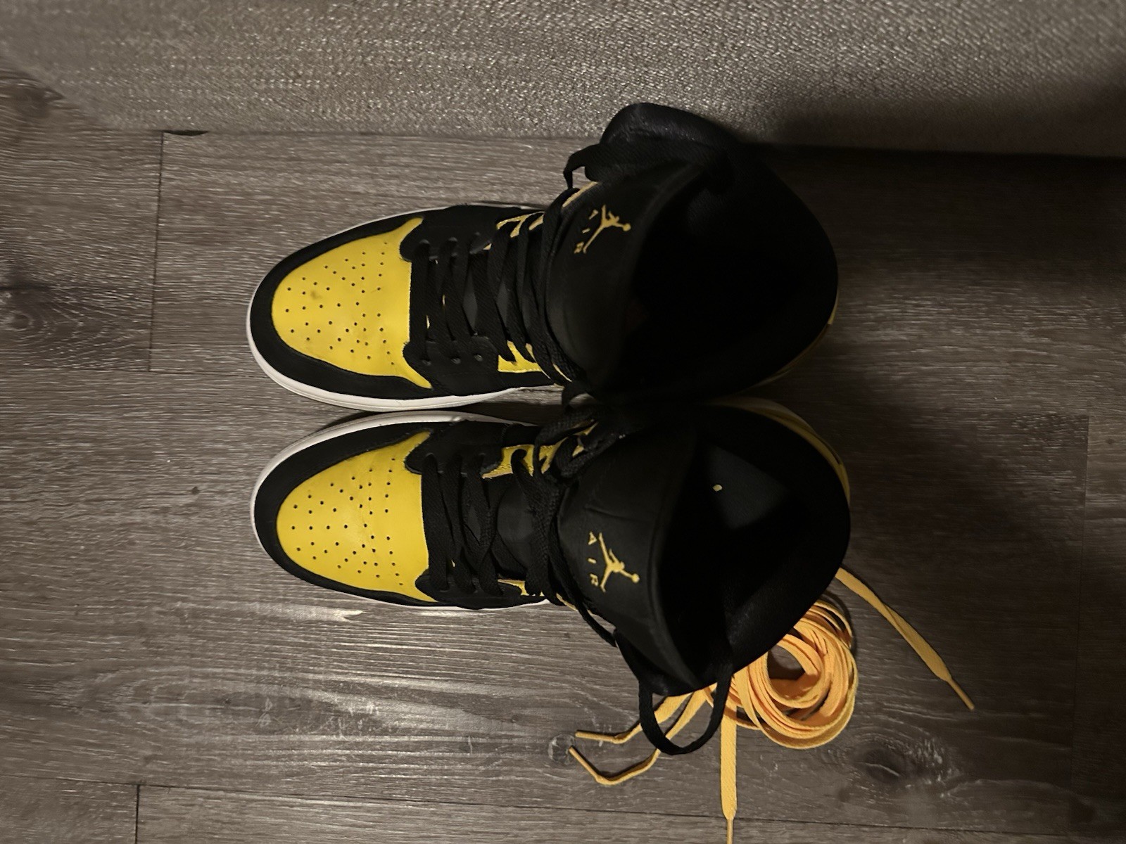 jordan air jordan 1 mid yellow/black leather high top men's sneaker jordan air jordan 1 mid yellow/black leather high top men's sneaker