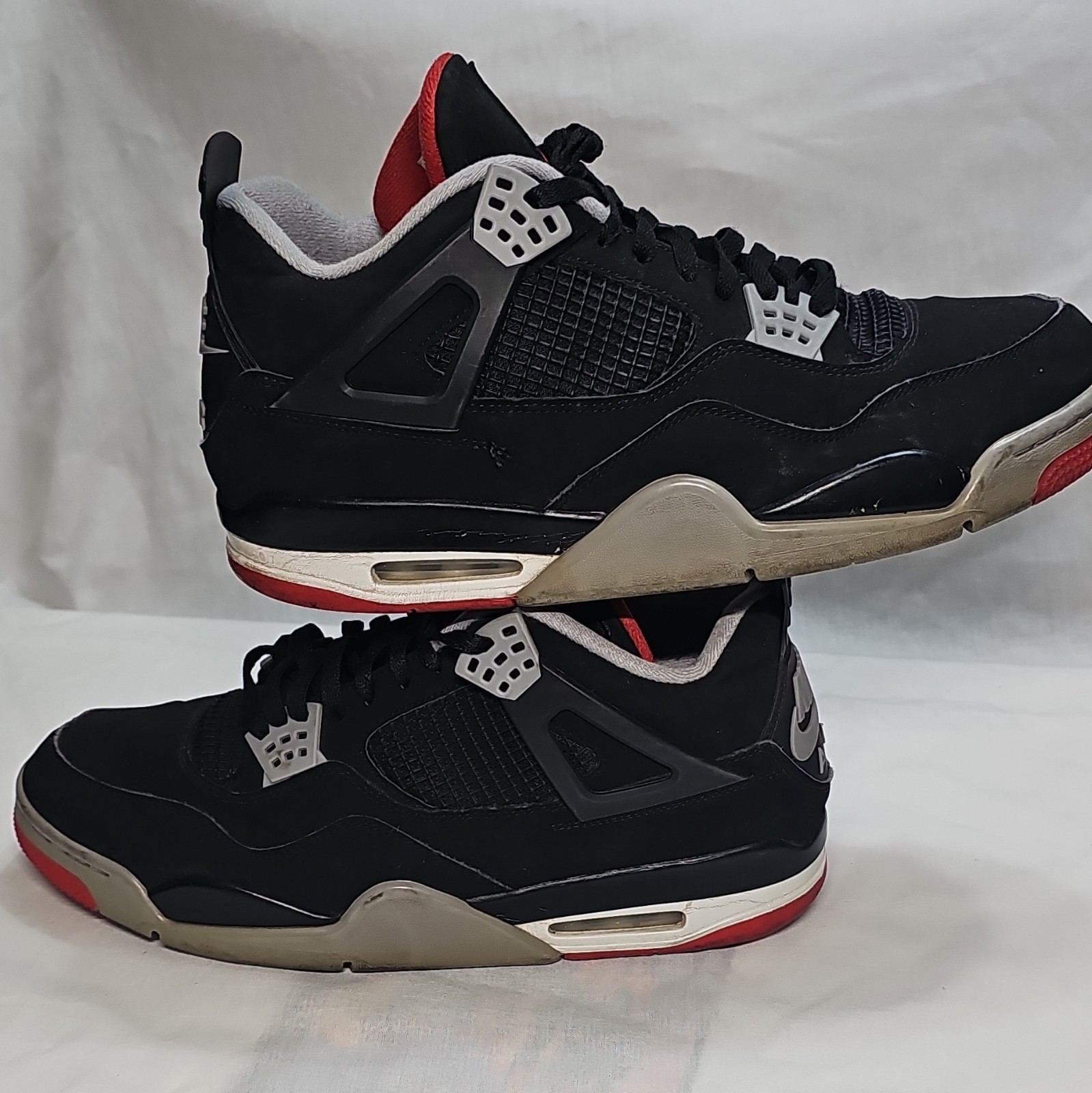 jordan air jordan 4 retro og bred black red and fire red cement colorway jordan air jordan 4 retro og bred black red and fire red cement colorway