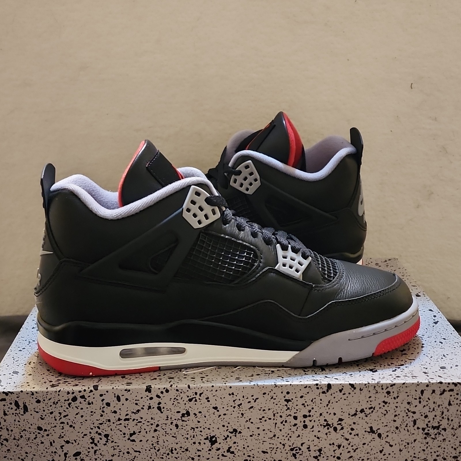 jordan air jordan 4 retro bred reimagined black/red fv5029 006 jordan air jordan 4 retro bred reimagined black/red fv5029 006