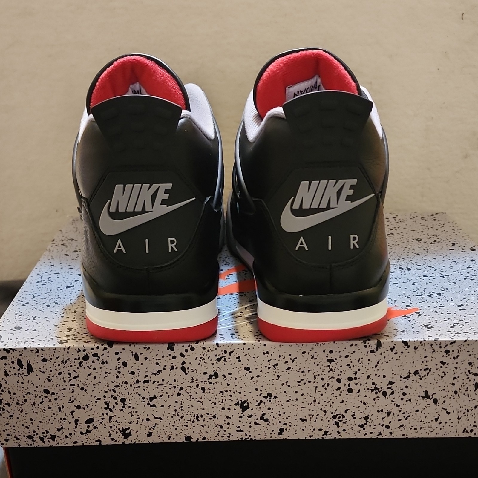 jordan air jordan 4 retro bred reimagined black/red fv5029 006 jordan air jordan 4 retro bred reimagined black/red fv5029 006