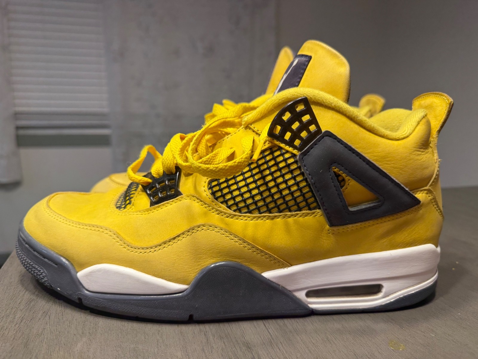 nike jordan iv lightning size 12 good condition (6/10) clean no rips or tears nike jordan iv lightning size 12 good condition (6/10) clean no rips or tears