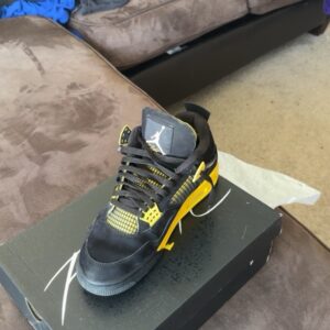 jordan air jordan 4 retro thunder 2023 black/tour yellow mid top dh6927 017