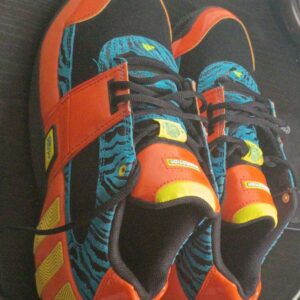 adidas men’s low top athletic sneaker lace up animal print orange/blue